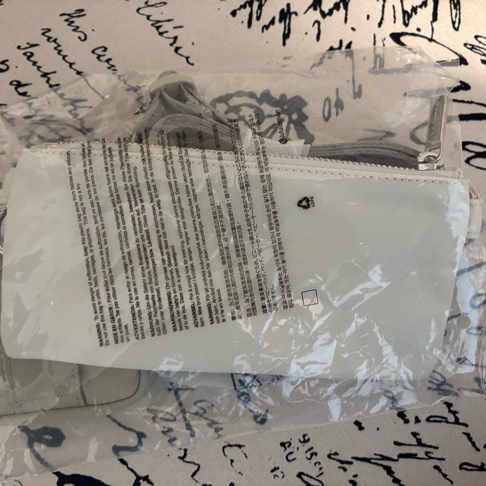 LULULEMON DUAL POUCH SLING
RAW LINEN/BONE - Picture 12 of 14
